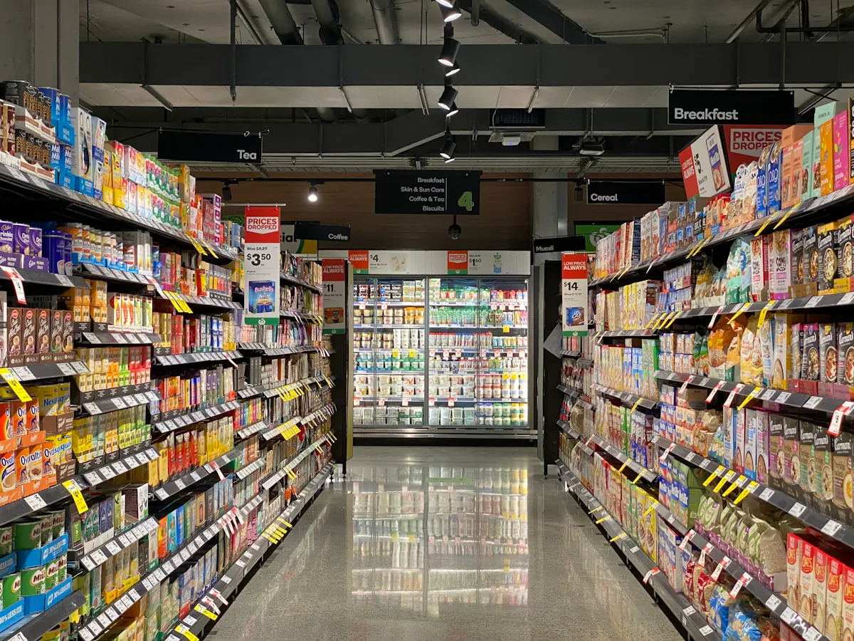 Well-stocked retail shelves with everyday products